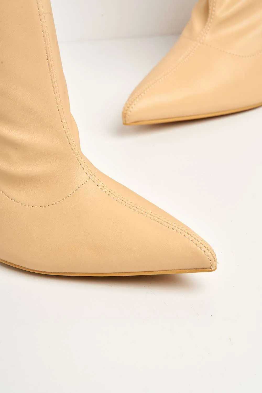 Eless Pointed Toe Stiletto Heeled Ankle Boots in Nude Matt